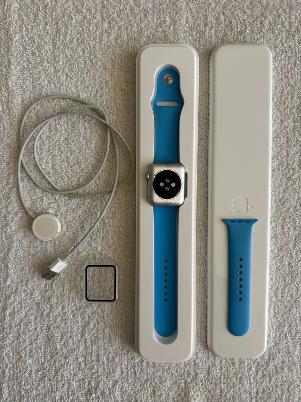 Apple Watch Series 3 with Bright Blue Sport Band Magnetic Charger and Case